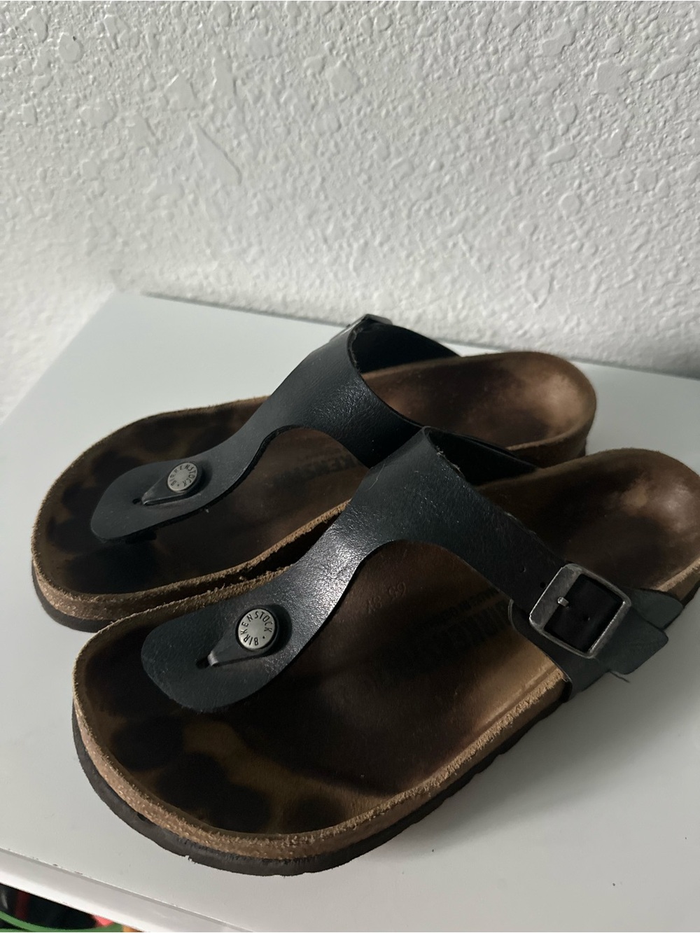 Birkenstock // Black Leather Gizeh Sandal with silver buckle